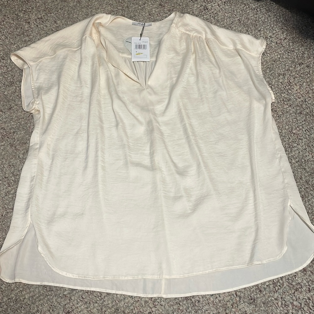 mat. Oversized tunic top